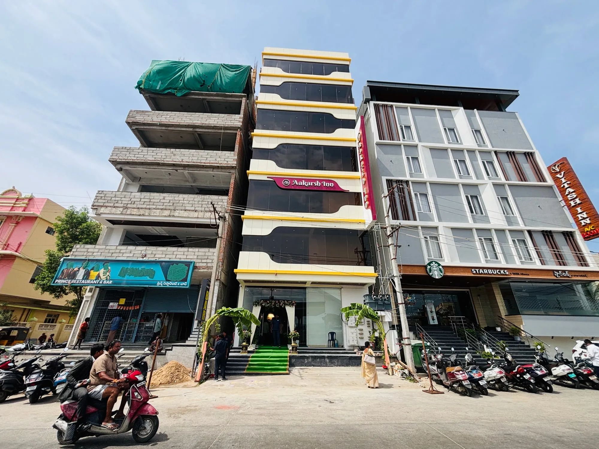 Tiruchanoor Road with Aakarsh Inn beside Starbucks